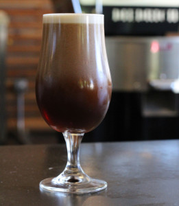 Beer in with glass with nitro gas