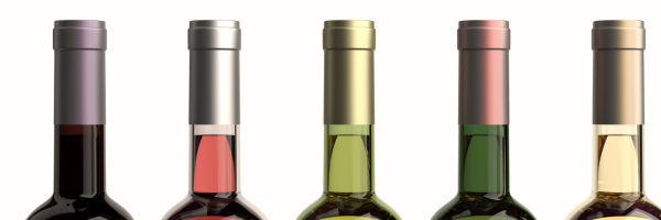 PBS When to bottle your wine blog - tops of 5 different colored wine bottles with hoods